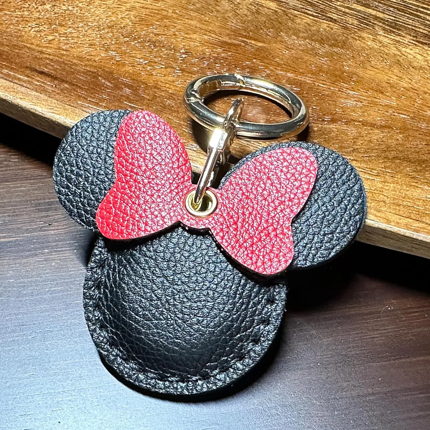 Handmade Genuine Leather Air Tag Holder - Cute Cartoon Keychain for Kids, Pets & Luggage, Durable Anti-Scratch Cover with Hidden Tracker Design, Gift-Ready Black (Compatible with Apple Air Tag)