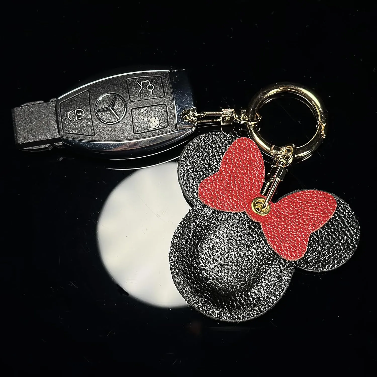 Handmade Genuine Leather Air Tag Holder - Cute Cartoon Keychain for Kids, Pets & Luggage, Durable Anti-Scratch Cover with Hidden Tracker Design, Gift-Ready Black (Compatible with Apple Air Tag)